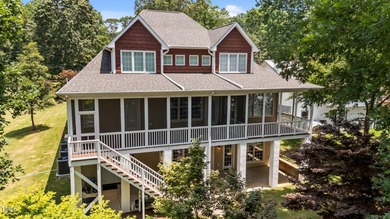 Discover the perfect blend of elegance, functionality, and on River Golf and County Club at Lake Royale in North Carolina - for sale on GolfHomes.com, golf home, golf lot