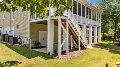 Discover the perfect blend of elegance, functionality, and on River Golf and County Club at Lake Royale in North Carolina - for sale on GolfHomes.com, golf home, golf lot