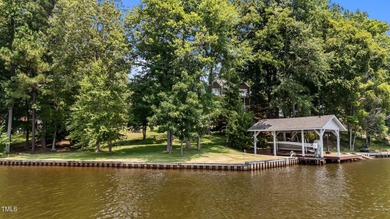 Discover the perfect blend of elegance, functionality, and on River Golf and County Club at Lake Royale in North Carolina - for sale on GolfHomes.com, golf home, golf lot