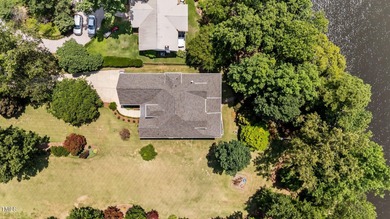 Discover the perfect blend of elegance, functionality, and on River Golf and County Club at Lake Royale in North Carolina - for sale on GolfHomes.com, golf home, golf lot