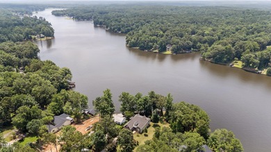 Discover the perfect blend of elegance, functionality, and on River Golf and County Club at Lake Royale in North Carolina - for sale on GolfHomes.com, golf home, golf lot