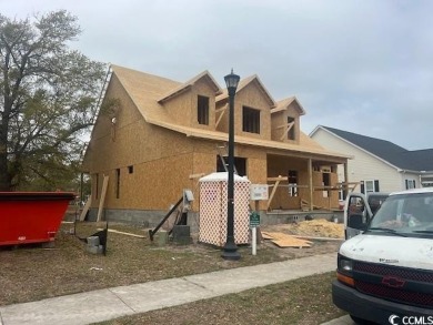 This beautiful home will be located in the popular Cherry Grove on Tidewater Golf Club and Plantation in South Carolina - for sale on GolfHomes.com, golf home, golf lot