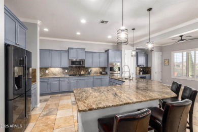 Stunning upgraded Regence model located on the 11th fairway on Poston Butte Golf Club in Arizona - for sale on GolfHomes.com, golf home, golf lot