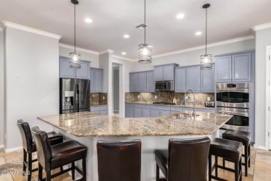 Stunning upgraded Regence model located on the 11th fairway on Poston Butte Golf Club in Arizona - for sale on GolfHomes.com, golf home, golf lot