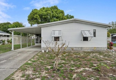 Welcome to this well-kept 2-bedroom, 2-bath home in the popular on Brookridge Country Club in Florida - for sale on GolfHomes.com, golf home, golf lot