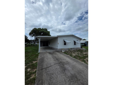 Welcome to this well-kept 2-bedroom, 2-bath home in the popular on Brookridge Country Club in Florida - for sale on GolfHomes.com, golf home, golf lot