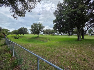 Welcome to this well-kept 2-bedroom, 2-bath home in the popular on Brookridge Country Club in Florida - for sale on GolfHomes.com, golf home, golf lot