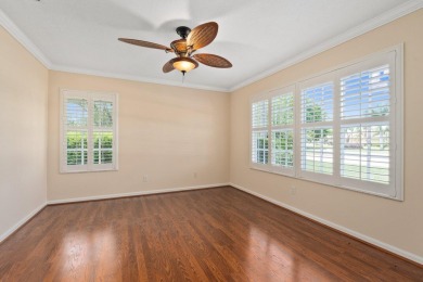 Tucked away on a serene half acre canal front homesite inside on Meadowood Golf and Tennis Club in Florida - for sale on GolfHomes.com, golf home, golf lot