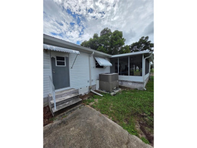 Welcome to this well-kept 2-bedroom, 2-bath home in the popular on Brookridge Country Club in Florida - for sale on GolfHomes.com, golf home, golf lot