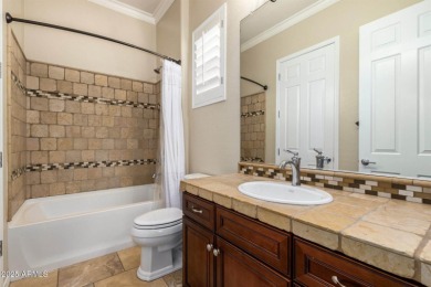 Stunning upgraded Regence model located on the 11th fairway on Poston Butte Golf Club in Arizona - for sale on GolfHomes.com, golf home, golf lot