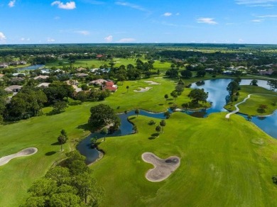 Tucked away on a serene half acre canal front homesite inside on Meadowood Golf and Tennis Club in Florida - for sale on GolfHomes.com, golf home, golf lot