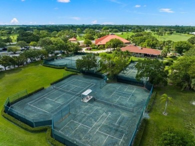 Tucked away on a serene half acre canal front homesite inside on Meadowood Golf and Tennis Club in Florida - for sale on GolfHomes.com, golf home, golf lot