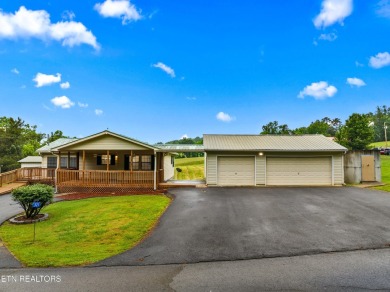 Endless possibilities await with this charming 2 bed/1 bath home on Dandridge Golf and Country Club in Tennessee - for sale on GolfHomes.com, golf home, golf lot