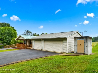 Endless possibilities await with this charming 2 bed/1 bath home on Dandridge Golf and Country Club in Tennessee - for sale on GolfHomes.com, golf home, golf lot
