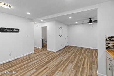 Endless possibilities await with this charming 2 bed/1 bath home on Dandridge Golf and Country Club in Tennessee - for sale on GolfHomes.com, golf home, golf lot