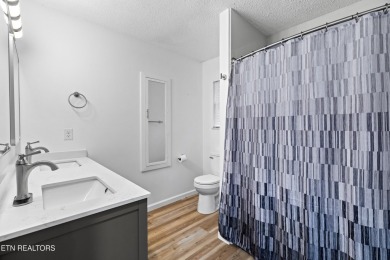Endless possibilities await with this charming 2 bed/1 bath home on Dandridge Golf and Country Club in Tennessee - for sale on GolfHomes.com, golf home, golf lot