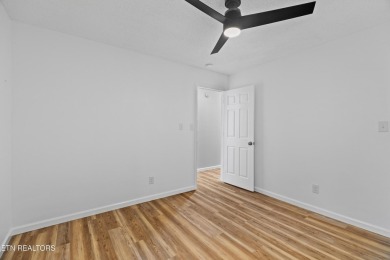 Endless possibilities await with this charming 2 bed/1 bath home on Dandridge Golf and Country Club in Tennessee - for sale on GolfHomes.com, golf home, golf lot