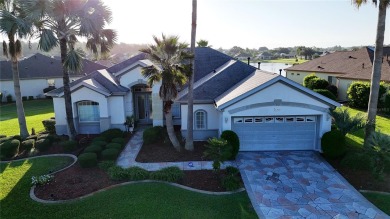 Sought after lake views  in Tamarron. Great curb appeal on Eagle Ridge At Spruce Creek Country Club in Florida - for sale on GolfHomes.com, golf home, golf lot