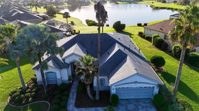 Sought after lake views  in Tamarron. Great curb appeal on Eagle Ridge At Spruce Creek Country Club in Florida - for sale on GolfHomes.com, golf home, golf lot