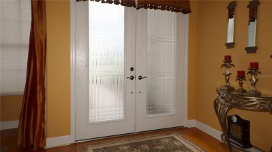 Sought after lake views  in Tamarron. Great curb appeal on Eagle Ridge At Spruce Creek Country Club in Florida - for sale on GolfHomes.com, golf home, golf lot