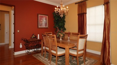 Sought after lake views  in Tamarron. Great curb appeal on Eagle Ridge At Spruce Creek Country Club in Florida - for sale on GolfHomes.com, golf home, golf lot