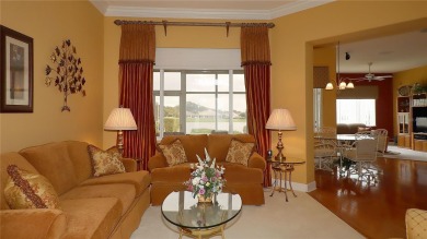 Sought after lake views  in Tamarron. Great curb appeal on Eagle Ridge At Spruce Creek Country Club in Florida - for sale on GolfHomes.com, golf home, golf lot