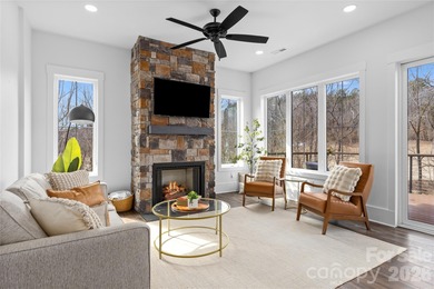 Experience modern elegance and breathtaking golf course views in on Verdict Ridge Golf and Country Club in North Carolina - for sale on GolfHomes.com, golf home, golf lot