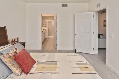 Step into this inviting and pristine first floor waterfront home on Colonial Country Club in Florida - for sale on GolfHomes.com, golf home, golf lot