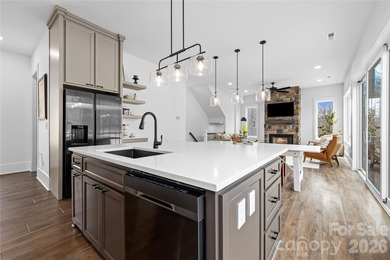 Experience modern elegance and breathtaking golf course views in on Verdict Ridge Golf and Country Club in North Carolina - for sale on GolfHomes.com, golf home, golf lot