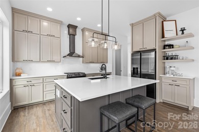 Experience modern elegance and breathtaking golf course views in on Verdict Ridge Golf and Country Club in North Carolina - for sale on GolfHomes.com, golf home, golf lot