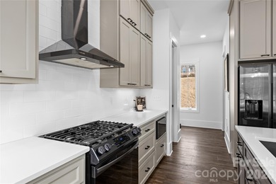 Experience modern elegance and breathtaking golf course views in on Verdict Ridge Golf and Country Club in North Carolina - for sale on GolfHomes.com, golf home, golf lot