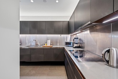 Welcome to this exquisite residence at Breakers Row in Palm on Breakers Ocean Golf Club in Florida - for sale on GolfHomes.com, golf home, golf lot