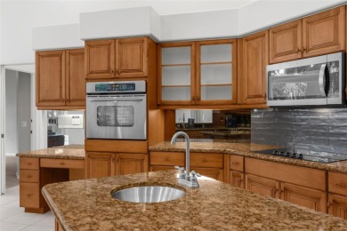 Under contract-accepting backup offers. Stunning Pool Home in on Calusa Lakes Golf Club in Florida - for sale on GolfHomes.com, golf home, golf lot