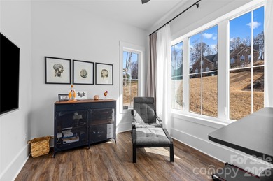 Experience modern elegance and breathtaking golf course views in on Verdict Ridge Golf and Country Club in North Carolina - for sale on GolfHomes.com, golf home, golf lot