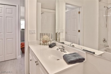 Step into this inviting and pristine first floor waterfront home on Colonial Country Club in Florida - for sale on GolfHomes.com, golf home, golf lot