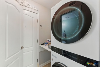 Welcome to this beautifully maintained 2 bed, 2.5 bath home in on Quail Creek Country Club in Texas - for sale on GolfHomes.com, golf home, golf lot