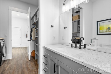 Experience modern elegance and breathtaking golf course views in on Verdict Ridge Golf and Country Club in North Carolina - for sale on GolfHomes.com, golf home, golf lot