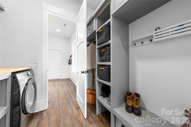 Experience modern elegance and breathtaking golf course views in on Verdict Ridge Golf and Country Club in North Carolina - for sale on GolfHomes.com, golf home, golf lot