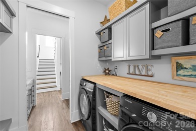 Experience modern elegance and breathtaking golf course views in on Verdict Ridge Golf and Country Club in North Carolina - for sale on GolfHomes.com, golf home, golf lot