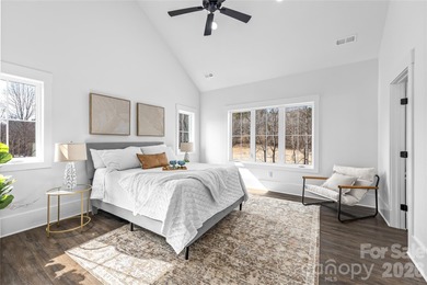 Experience modern elegance and breathtaking golf course views in on Verdict Ridge Golf and Country Club in North Carolina - for sale on GolfHomes.com, golf home, golf lot