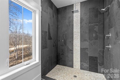 Experience modern elegance and breathtaking golf course views in on Verdict Ridge Golf and Country Club in North Carolina - for sale on GolfHomes.com, golf home, golf lot