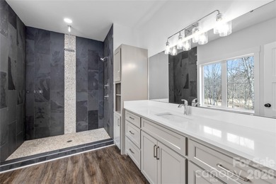 Experience modern elegance and breathtaking golf course views in on Verdict Ridge Golf and Country Club in North Carolina - for sale on GolfHomes.com, golf home, golf lot