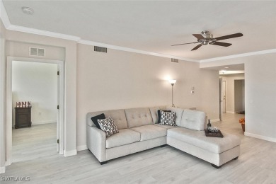 Step into this inviting and pristine first floor waterfront home on Colonial Country Club in Florida - for sale on GolfHomes.com, golf home, golf lot