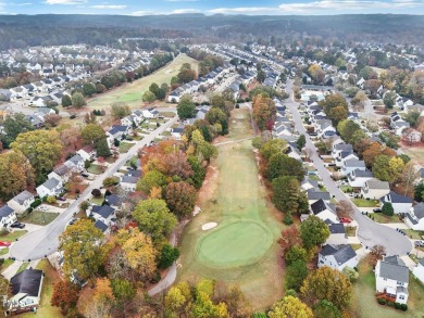 Welcome to 1909 Shadow Glen Drive, a beautifully updated home on Hedingham Golf and Athletic Club in North Carolina - for sale on GolfHomes.com, golf home, golf lot