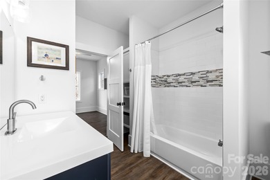 Experience modern elegance and breathtaking golf course views in on Verdict Ridge Golf and Country Club in North Carolina - for sale on GolfHomes.com, golf home, golf lot