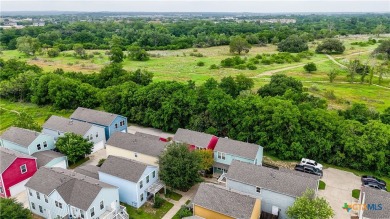 Welcome to this beautifully maintained 2 bed, 2.5 bath home in on Quail Creek Country Club in Texas - for sale on GolfHomes.com, golf home, golf lot