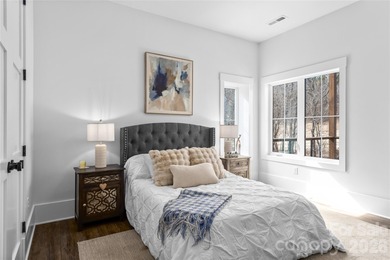 Experience modern elegance and breathtaking golf course views in on Verdict Ridge Golf and Country Club in North Carolina - for sale on GolfHomes.com, golf home, golf lot