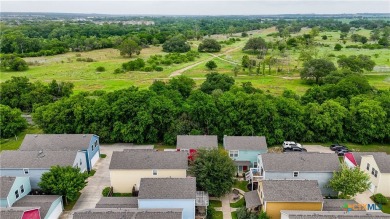 Welcome to this beautifully maintained 2 bed, 2.5 bath home in on Quail Creek Country Club in Texas - for sale on GolfHomes.com, golf home, golf lot
