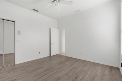 Under contract-accepting backup offers. Stunning Pool Home in on Calusa Lakes Golf Club in Florida - for sale on GolfHomes.com, golf home, golf lot