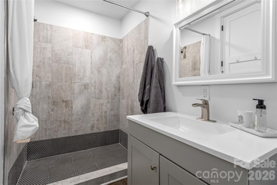 Experience modern elegance and breathtaking golf course views in on Verdict Ridge Golf and Country Club in North Carolina - for sale on GolfHomes.com, golf home, golf lot